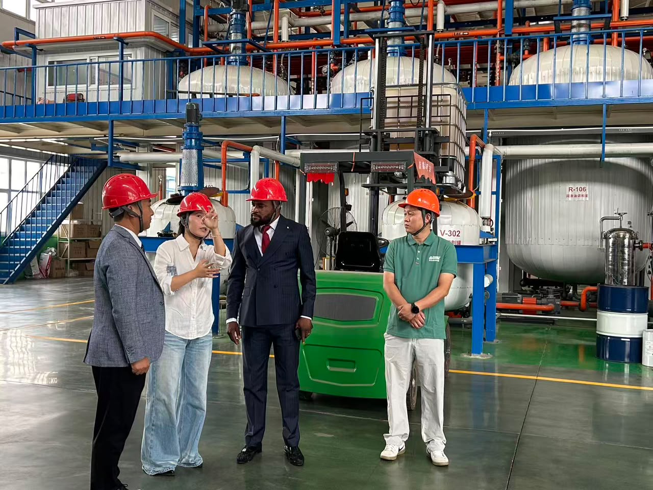 The founder touring a lubricant blending plant in China
