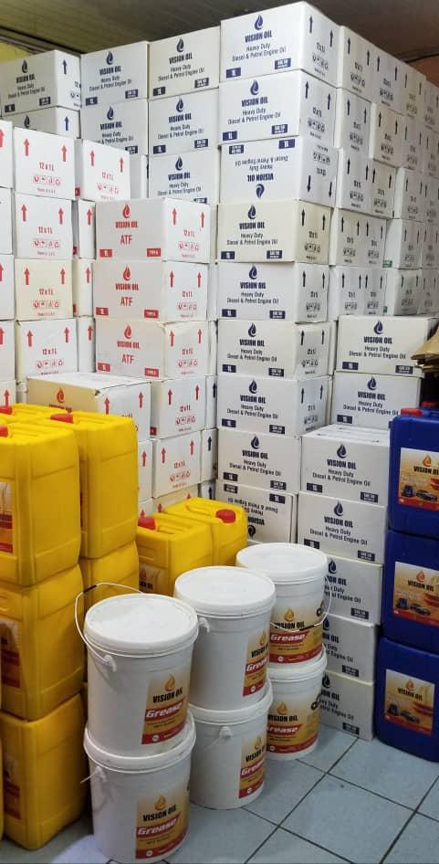 Vision Oil stocked boxes and jerrycans