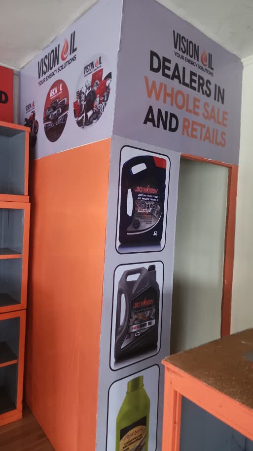 Vision Oil shop signage — dealers in wholesale and retail